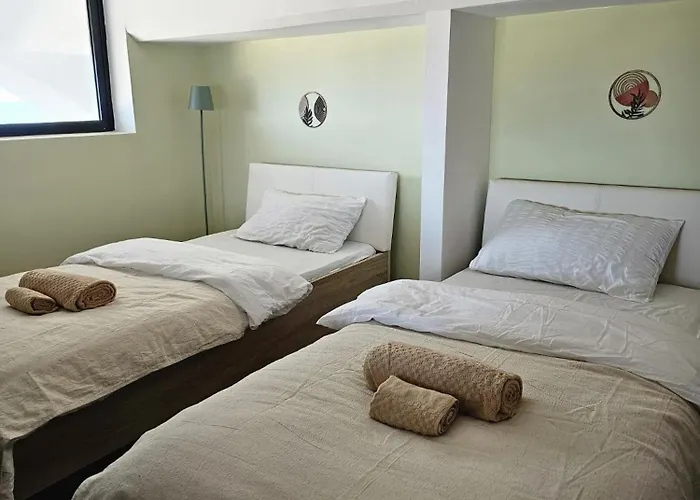 Soulnest Light Bedroom And Shared Bathroom Qbajjar